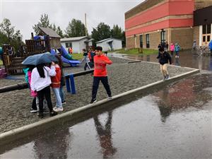 kids playing in rain 